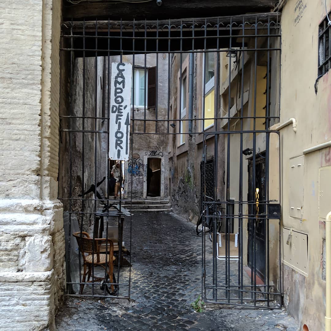 One of my favorite things to do in a new city is explore it on foot acting like I know what I’m doing. I check out a map, get some rough directional ideas in my head, then just walk.
I *was* trying to get to Campo de’ Fiori, so this not-sketchy-at-all navigational aid and dark alley was perfectly placed